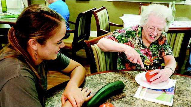 1 Prater cutting tomato