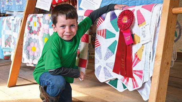 rotator-1--boy-with-quilt