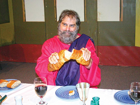 living last supper- jesus breaking bread.jpg