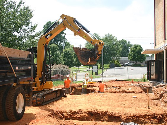 civic center renovation- backhoe and workers original.jpg