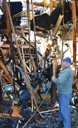 perry's fire- perry looking at damage.jpg