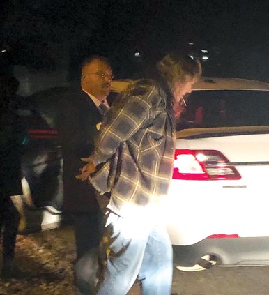 Paul Adcock being arrested II.jpg