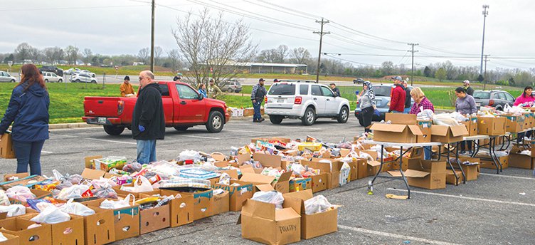 free food - volunteers loading up boxes.jpg