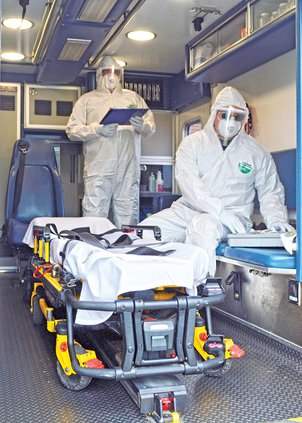 Ambulance guys - protective gear.jpg