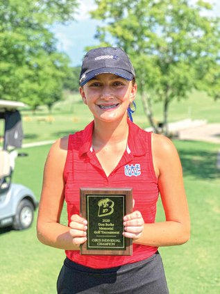Lauren Slatton with plaque.jpg