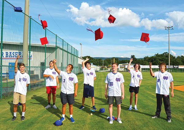 Seniors throw caps.jpg