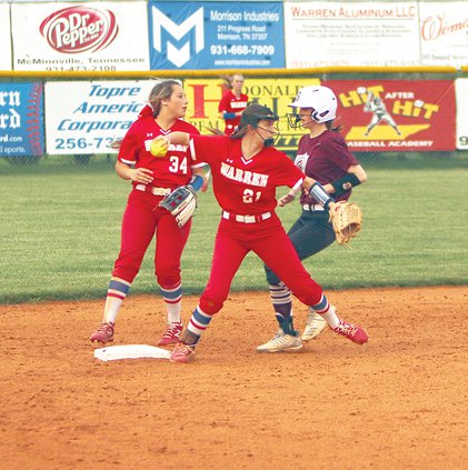 Alyssa Mosley steps on 2nd and makes the throw to First 4-9.jpg