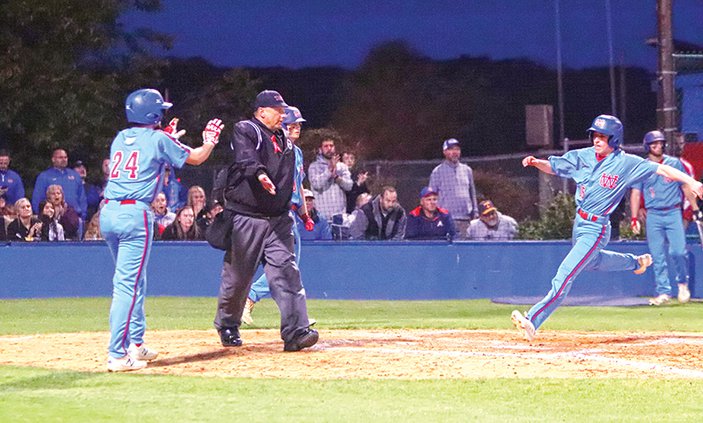 Ben Rivers reaching for home plate 5-11.jpg