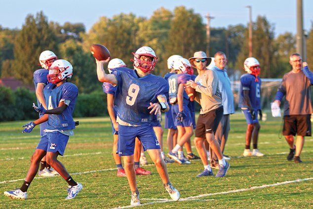 FB - Nate Elrod Throwing - Coach Bond 10-12.jpg
