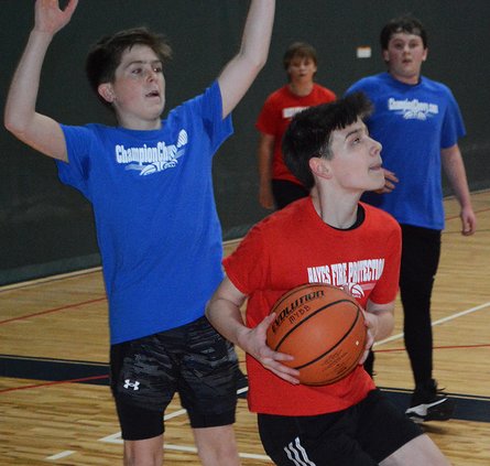City - Jaxson Rhea with ball, Corban Felton.jpg